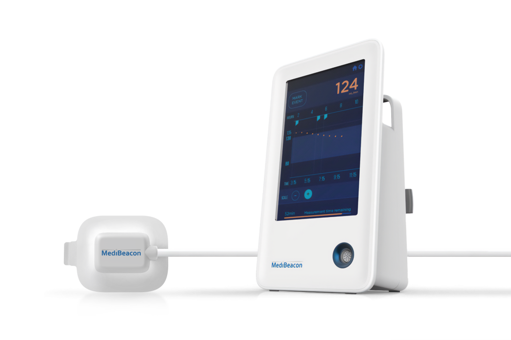 A product photograph of MediBeacon's white vital signs monitor and sensor against a light gray background.