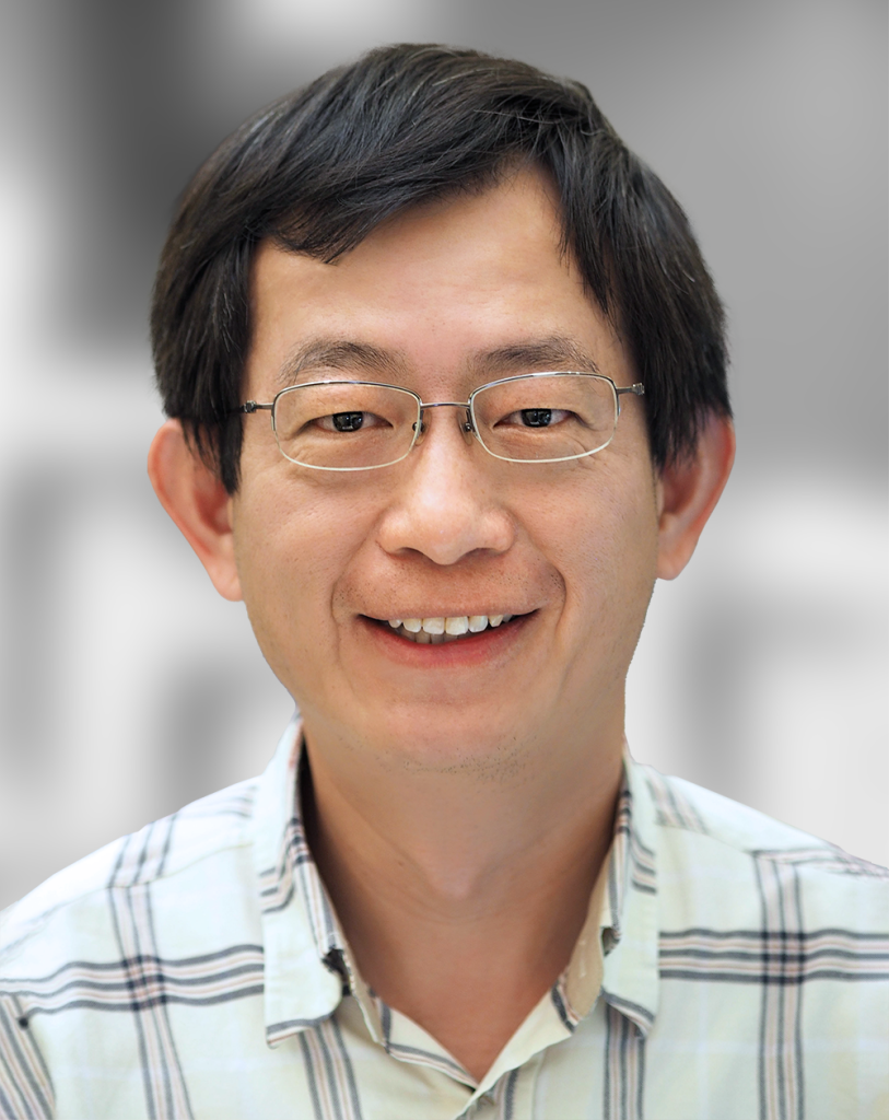 A portrait of Maw-Lin Kuo, a smiling man with glasses wearing a plaid shirt against a blurred background.