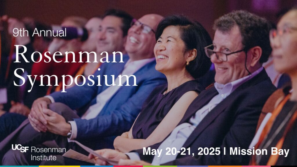 A diverse group of people sit and smile in an auditorium at the 9th Annual Rosenman Symposium, hosted by UCSF, scheduled for May 20-21, 2025, in Mission Bay.