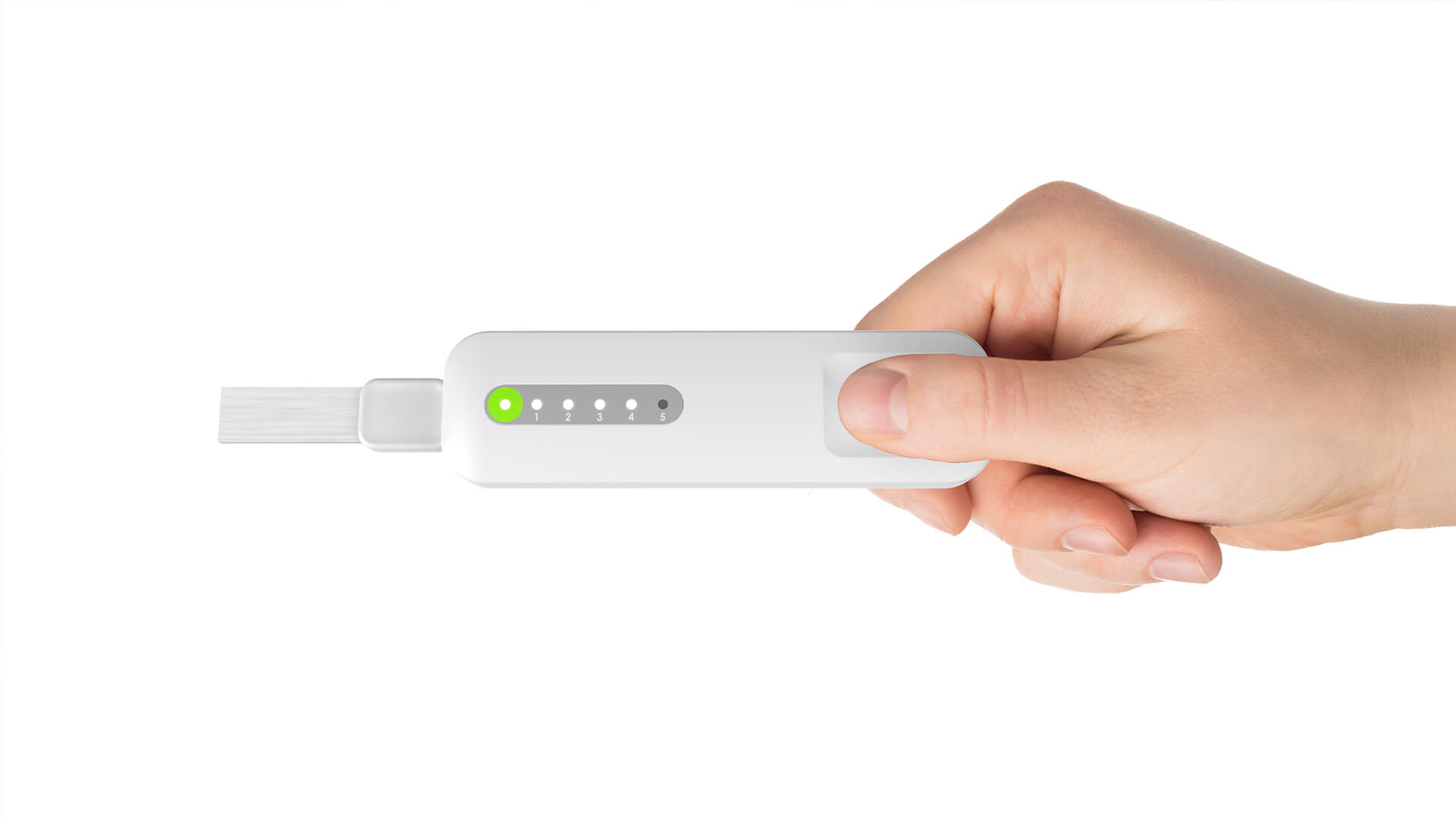 A hand holds a white electronic device with a brush tip and a row of five indicator lights, one of which is green, against a white background.